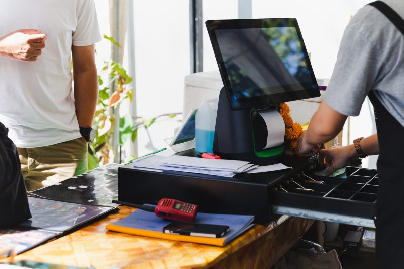 Woman at the Cashier Counter